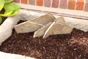 Trough filled with compost 